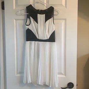 Edgy black and white pleated dress